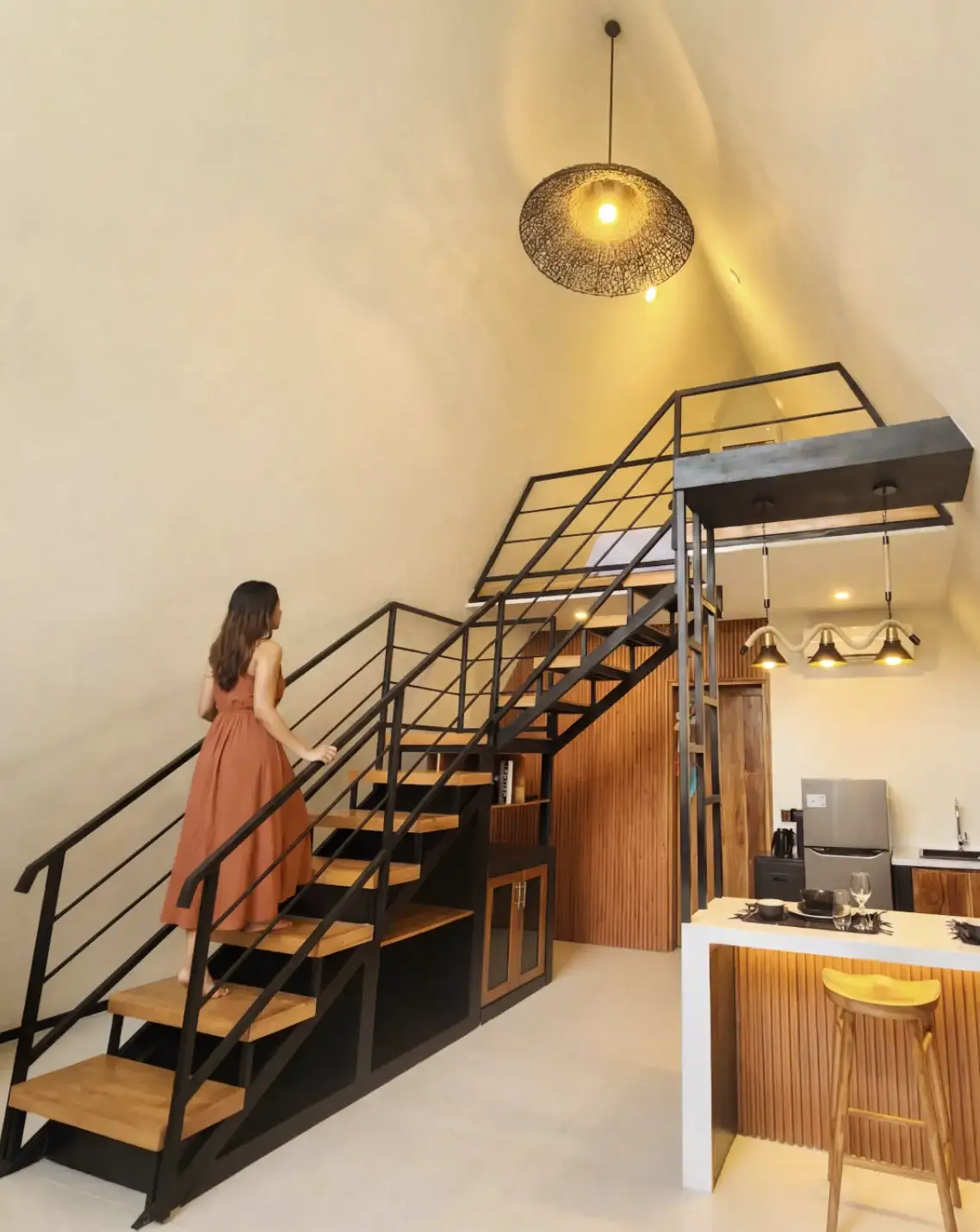 Woman Walking in Villas Interior